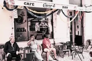Locals in front of a Cafe in Portugal