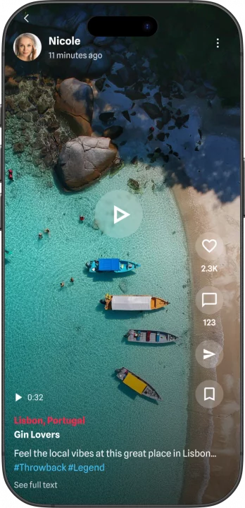 2B LOCAL video / reel screen: Aerial view of a turquoise bay with colorful boats near a sandy beach; video UI overlays show a post from Nicole about Lisbon, Gin Lovers.